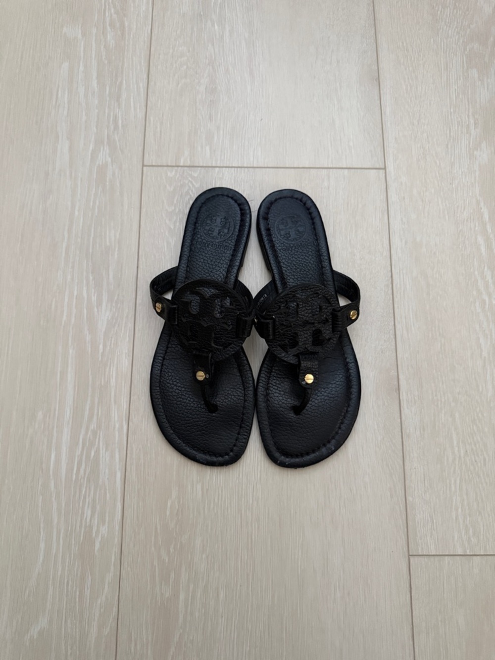 Tory Burch Black Sandals with Gold Accents